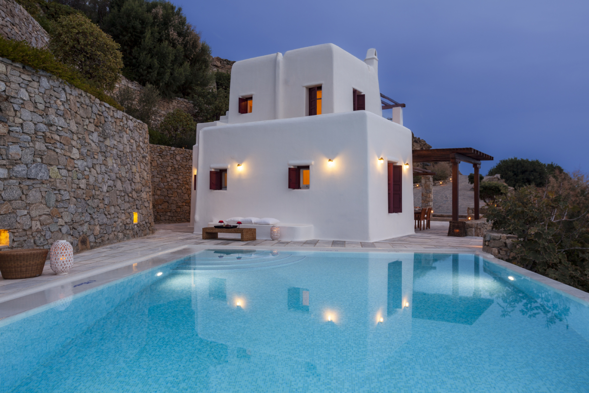 Evening view of the pool at Villa Eirene, a private villa for rent Mykonos at AGL