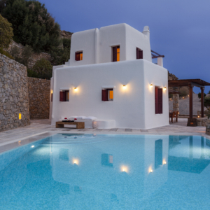 Evening view of the pool at Villa Eirene, a private villa for rent Mykonos at AGL