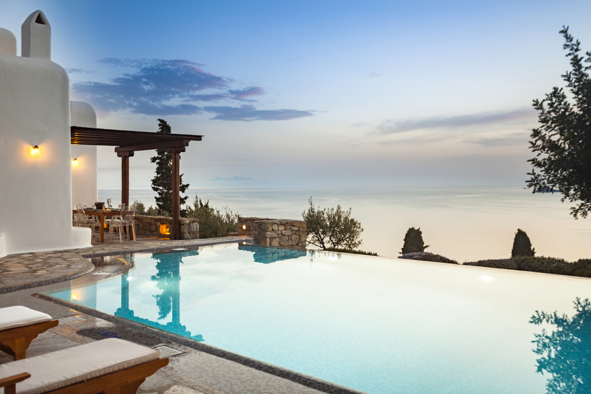 Villa Aphrodite, one of AGL's luxury villas in mykonos with private pool just before sunset
