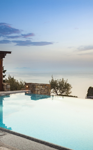Villa Aphrodite, one of AGL's luxury villas in mykonos with private pool just before sunset