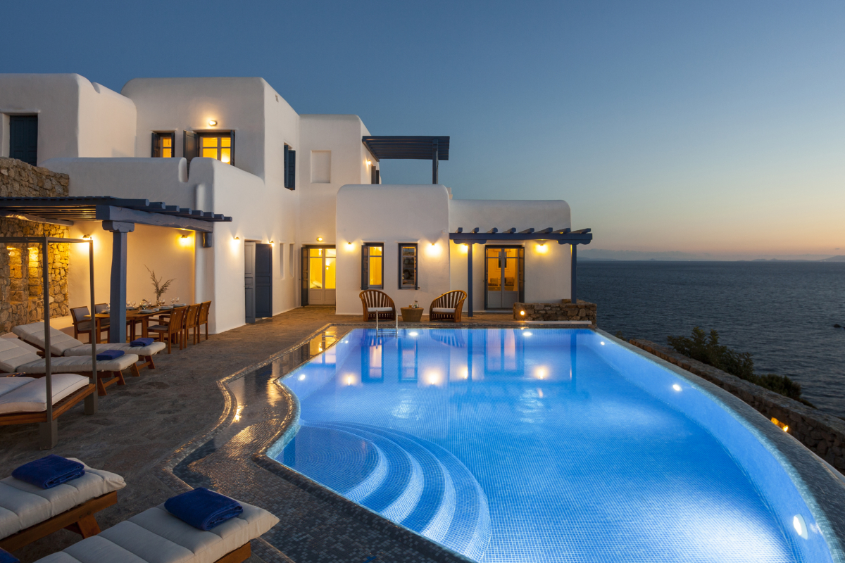Evening view of pool at Villa Ambrosia by AGL Mykonos private pool villas