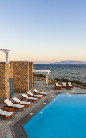 Sunset hour and pool at Villa Posidonia, a Mykonos luxury villas with seaview by AGL